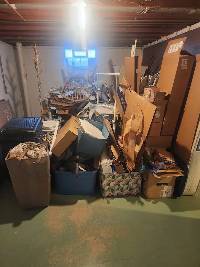 Roll-off dumpster container at job site for Concrete Dumpster Rental in Parkville